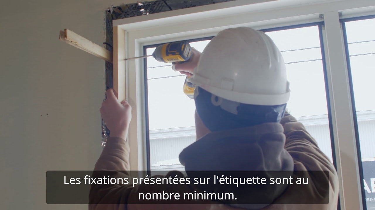 Installation d'une fenêtre oscillo-battante