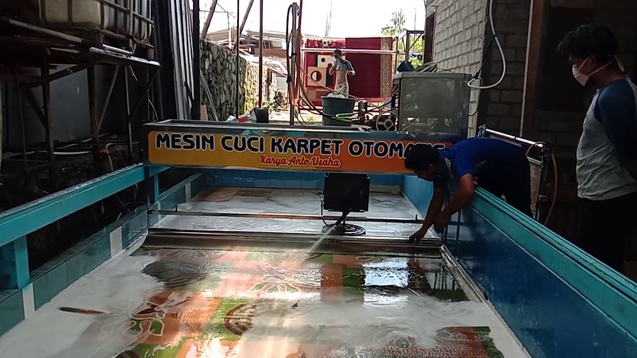 Robot pencuci karpet