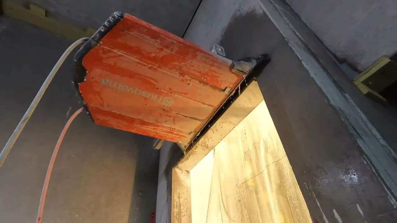 Cutting The Top Of The Elevator Shaft, Husqvarna WS 482 HF.