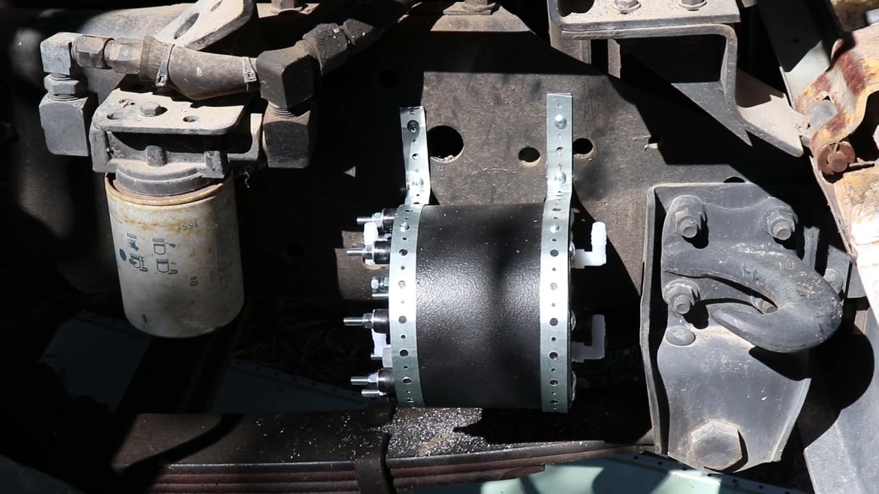 Hydrogen generator secured with brackets to vehicle.
