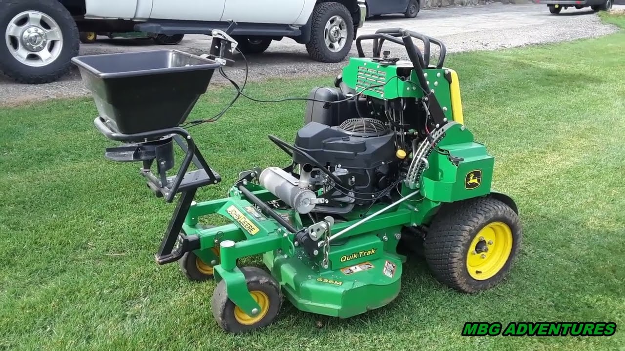 Fertilizer/Grass Seed Power Spreader on John Deere 636M Stand On Mower