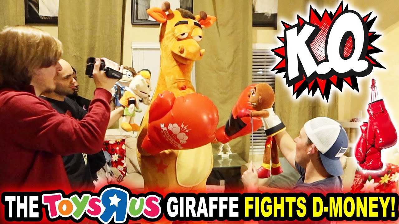 THE TOYS R US GIRAFFE FIGHTS D-MONEY!