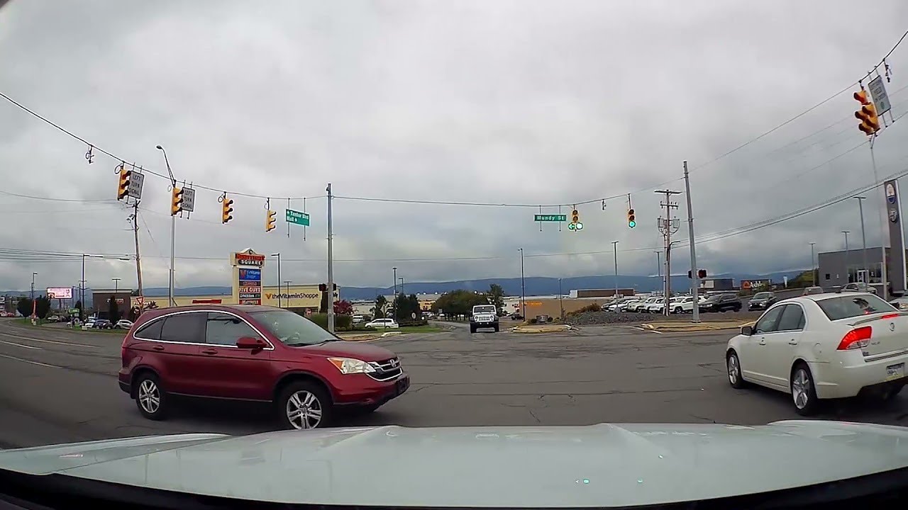 Car Runs Red Light in Front of Police || ViralHog