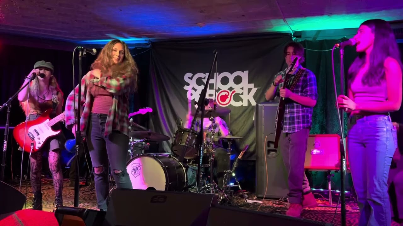 Addison performing “Do the Evolution” by Pearl Jam with School of Rock at The Stanhope House