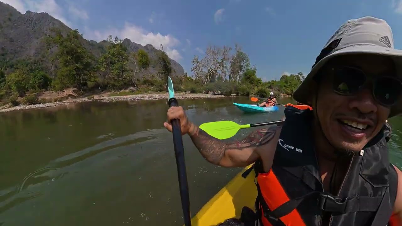 Kayaking in Vang Vieng, Laos with friends and family