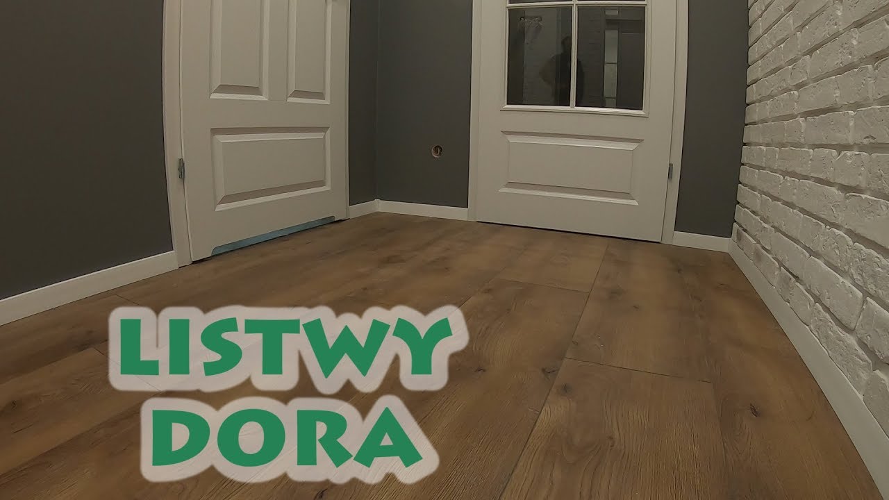 Montaż białych listew przypodłogowych Dora Arbiton#