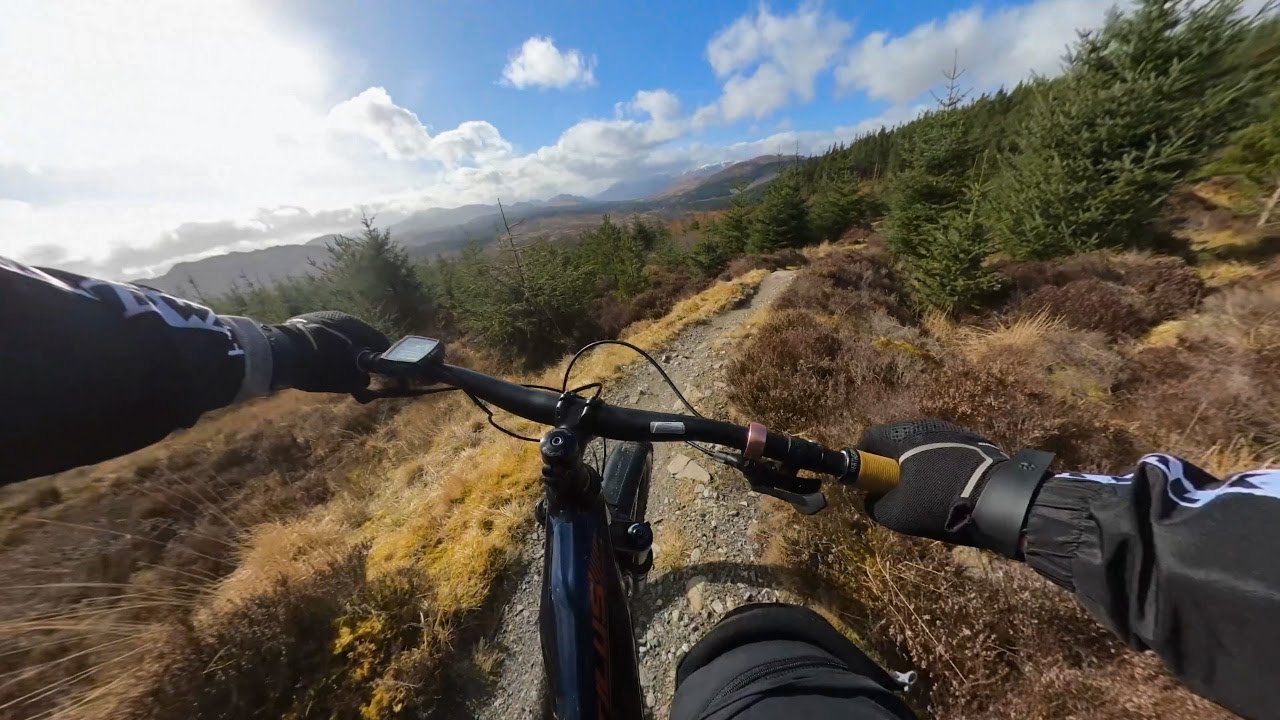 Mtb trail riding "Alpha Red Descent" red grade trail, Laggan Woltrax mtb trail, Scotland.