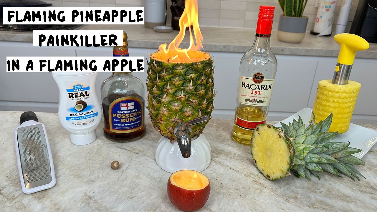Flaming Pineapple Painkiller in a Flaming Apple