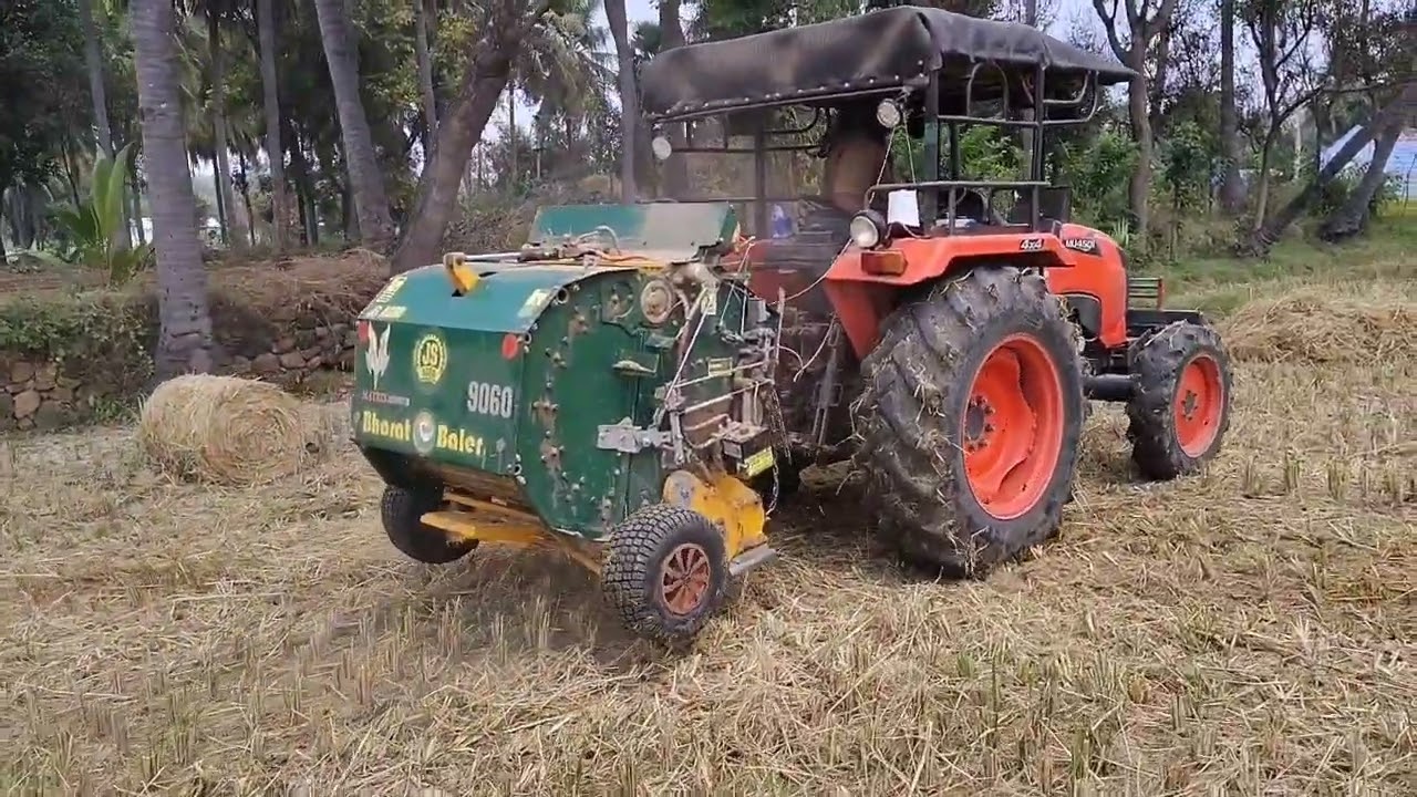 Kubota 4501 with Bharath baler . Paddy field performance 