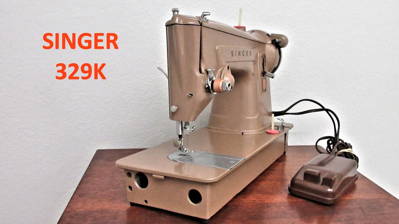 SINGER 329K W/ INSIDE OUT TOUR, BOBBIN WIND, NEEDLE THREADING, 7-LAYER SEWING