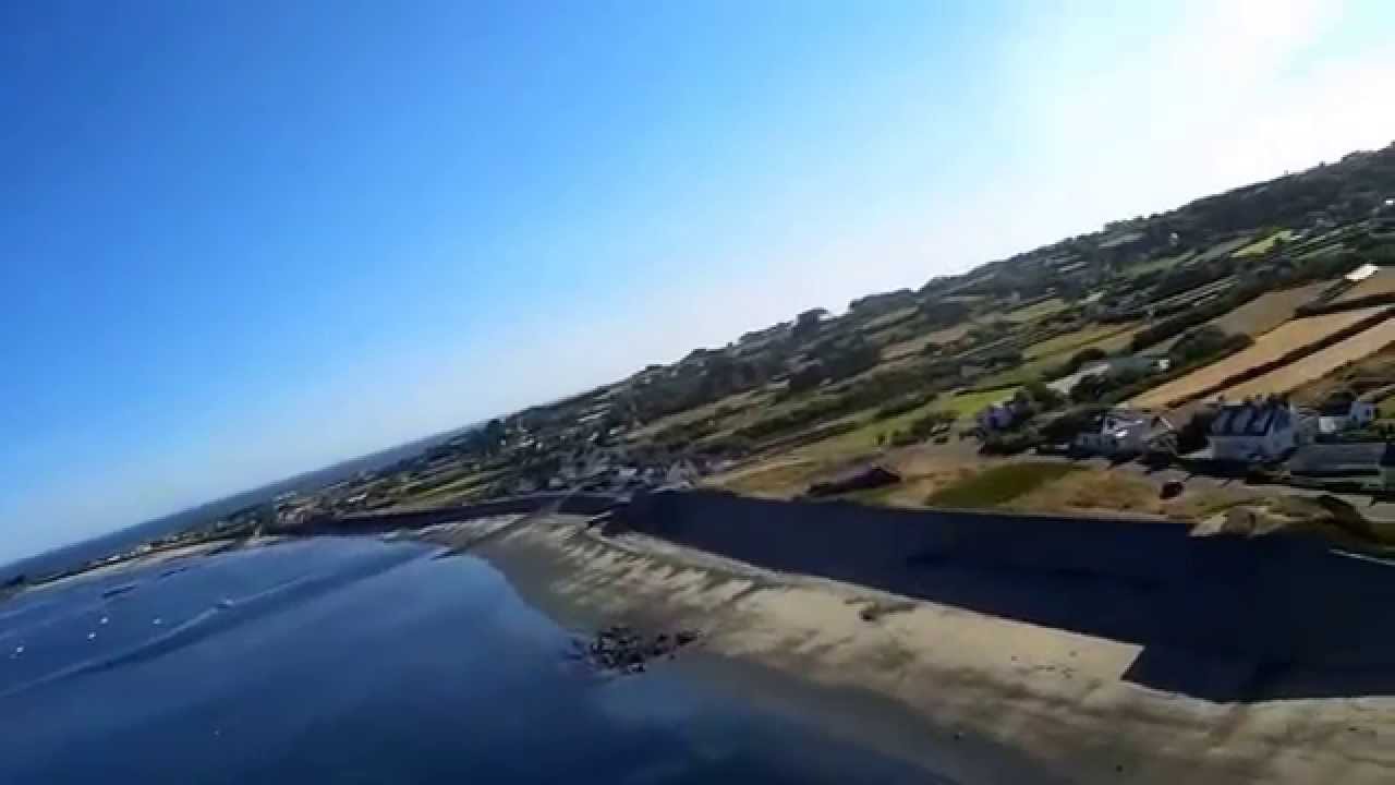 KFm-4 wing carrying Mobius over Rocquaine bay & Fort Grey, Guernsey