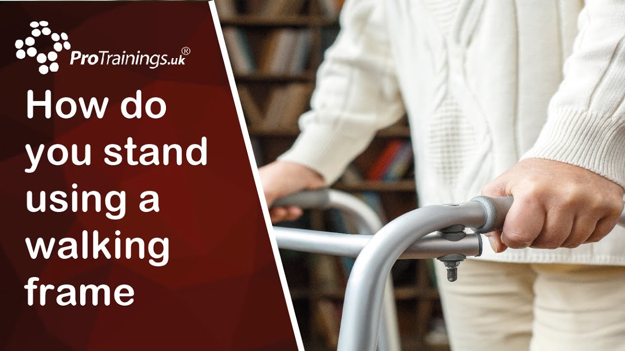 How do you stand using a walking frame