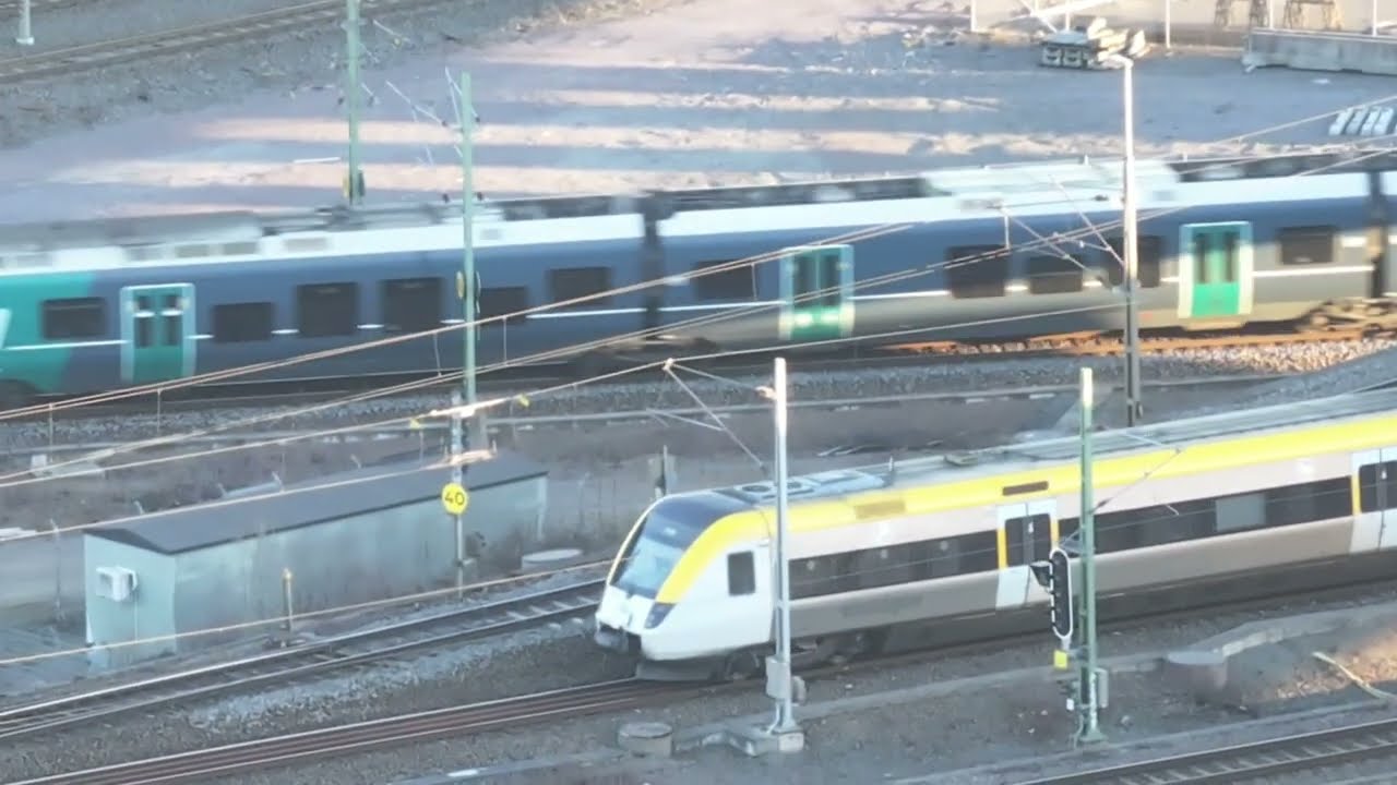 Drone, trailer, a cargo train and lots of trains. Text below.