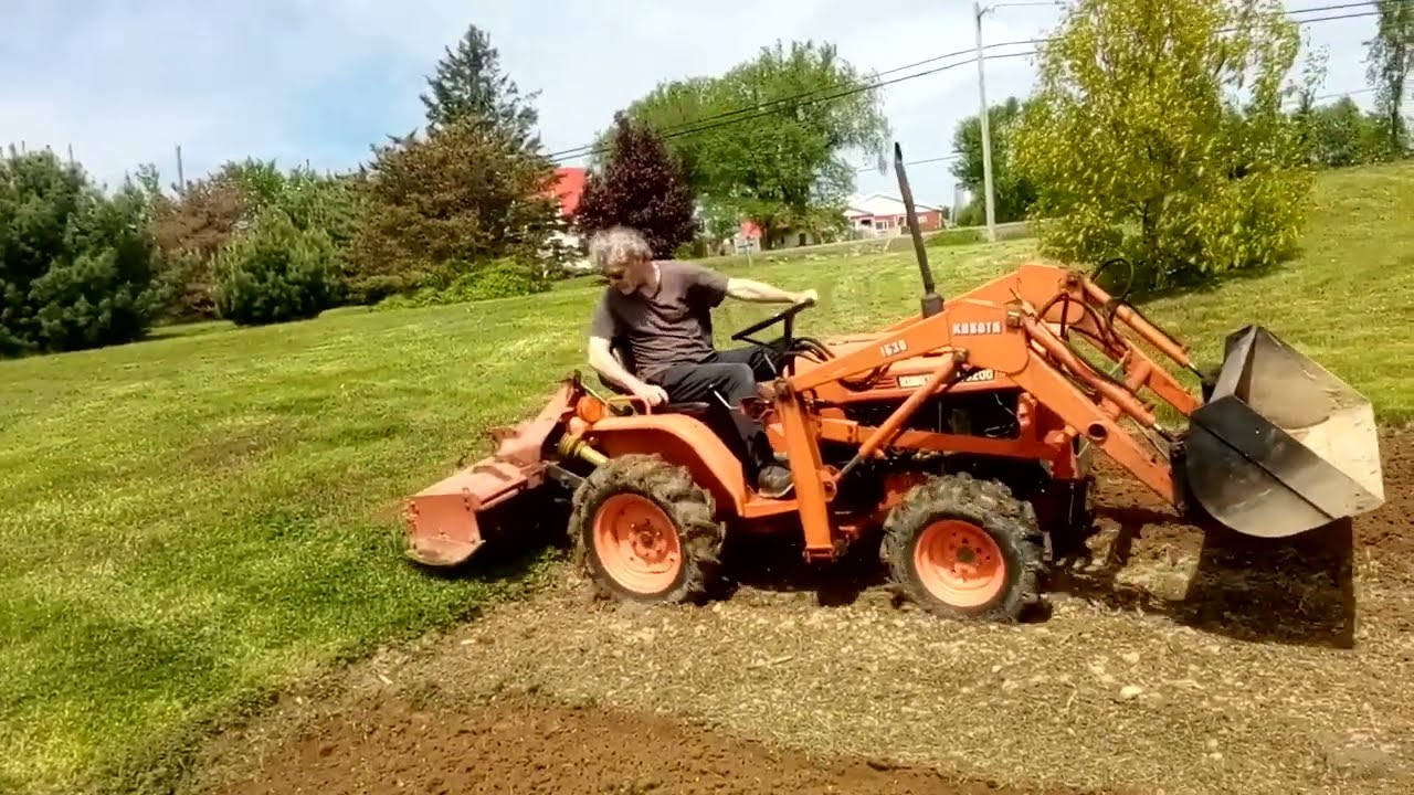 Kubota B6200, tilling the garden.