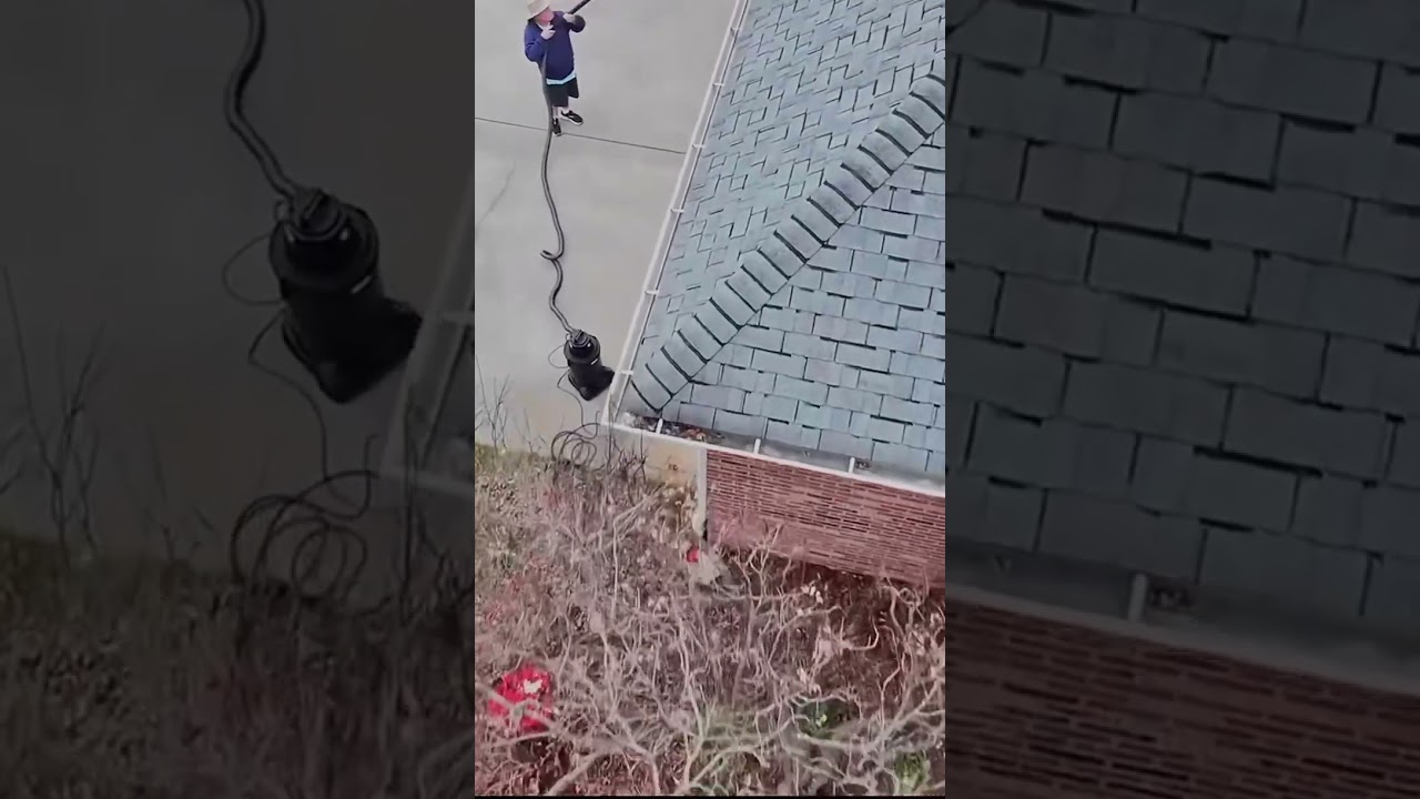 Using the Skyvac Gutter Vacuum to clean gutters from the ground!