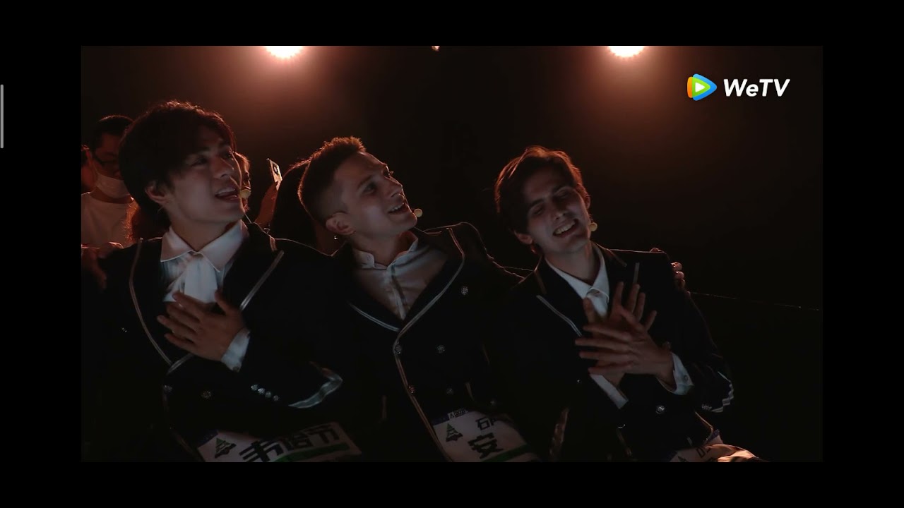 Trainees, Mentors, R1SE Reaction of Zhou Shen singing 'Champions' .