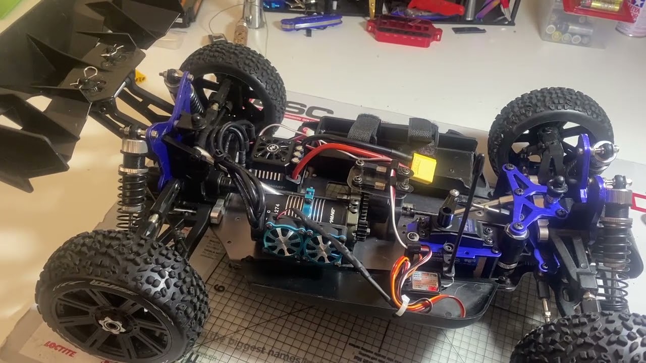 Nitro to Electric build Finished Runs very well cheap as possable  1/8 Buggy