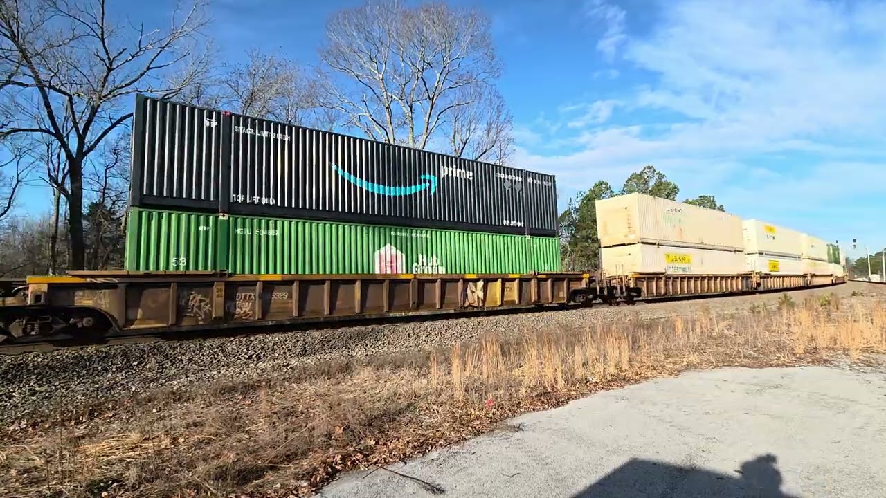 A trio of NS power clears the wye with the southbound stack & rack 