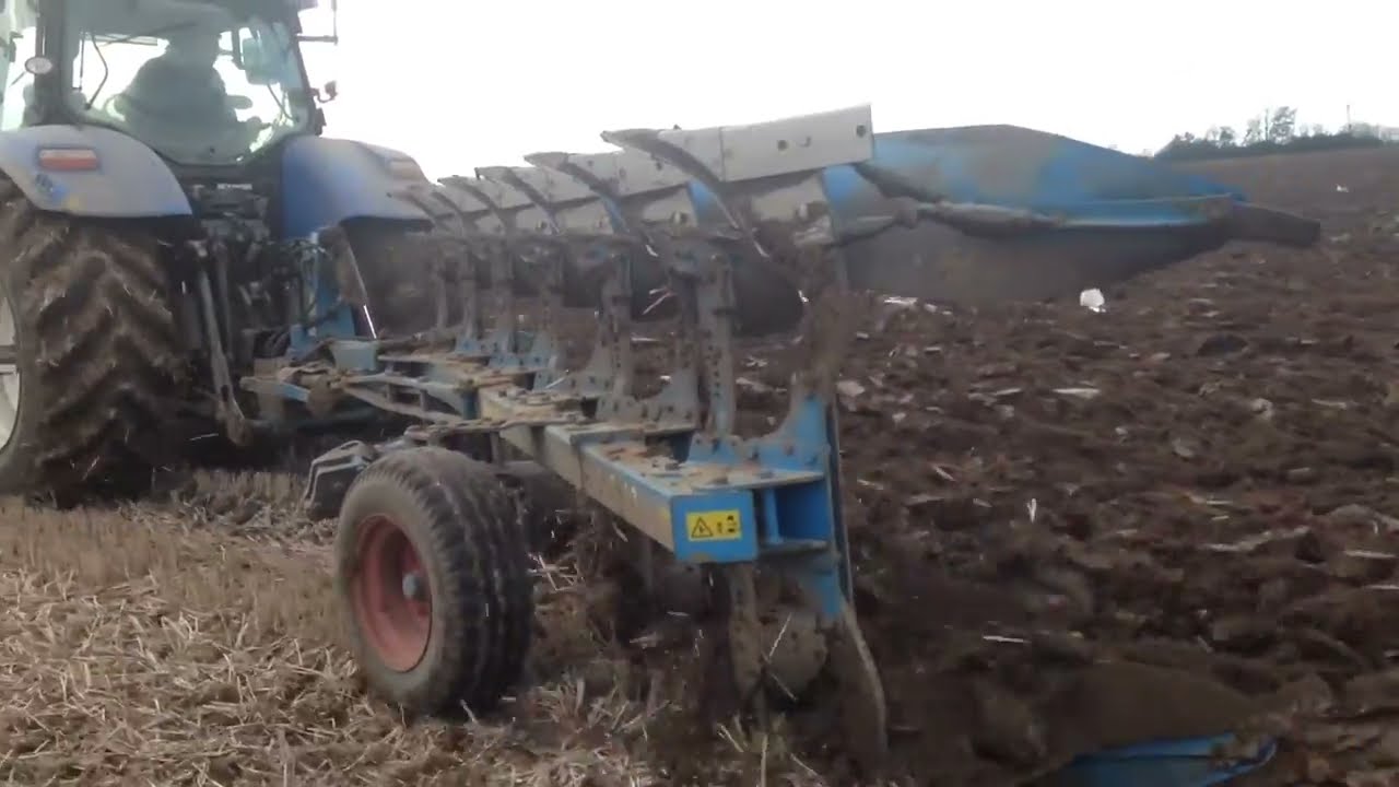 New Holland 7060 & 6 Furrow Lemkin Plough.