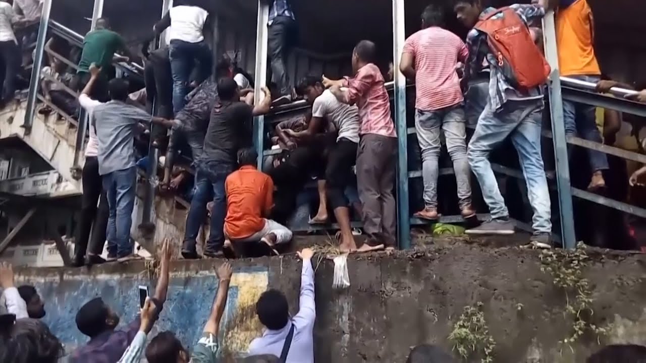 Mumbai stampede: at least 22 killed in fatal rush-hour crush – video report