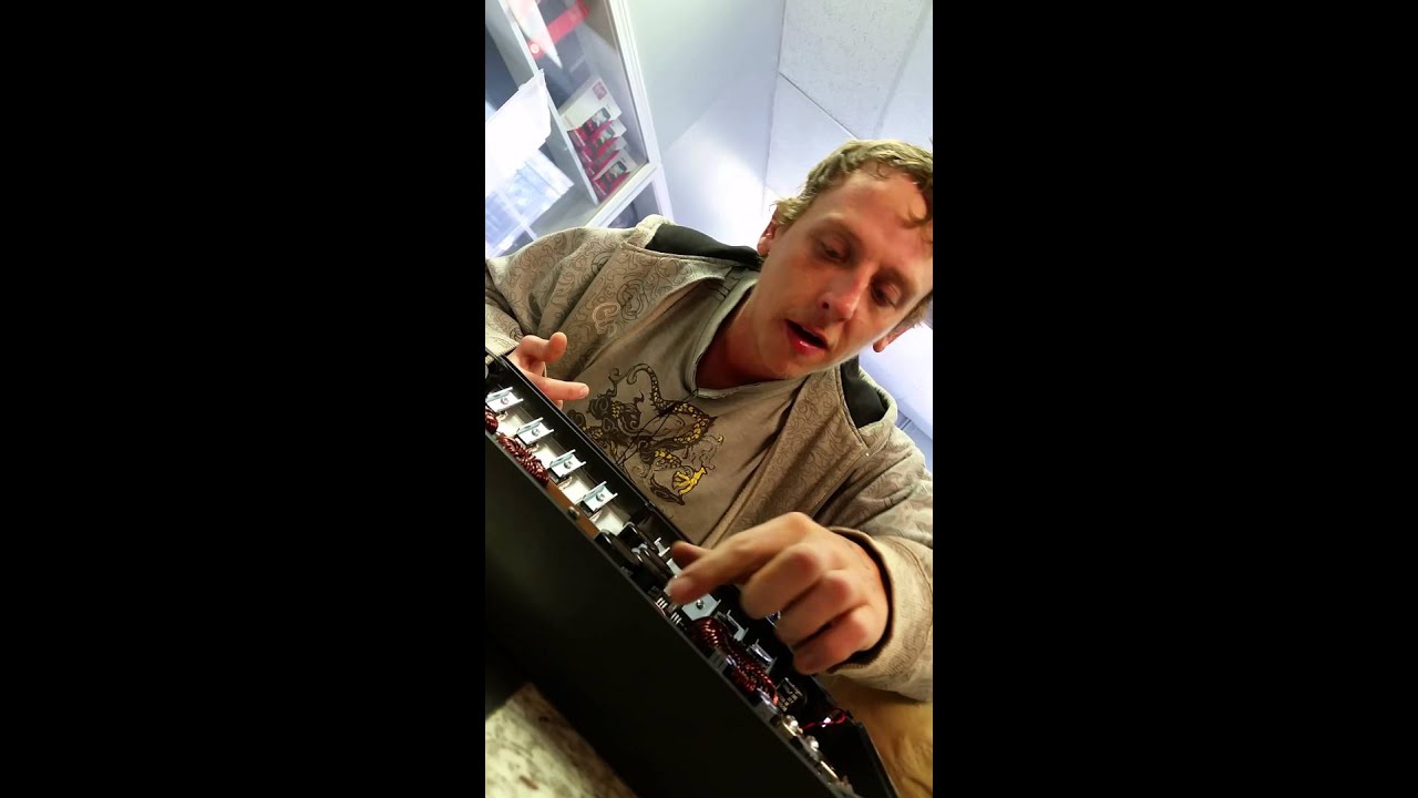 Chris AudioFix examines a blown Banda 7k