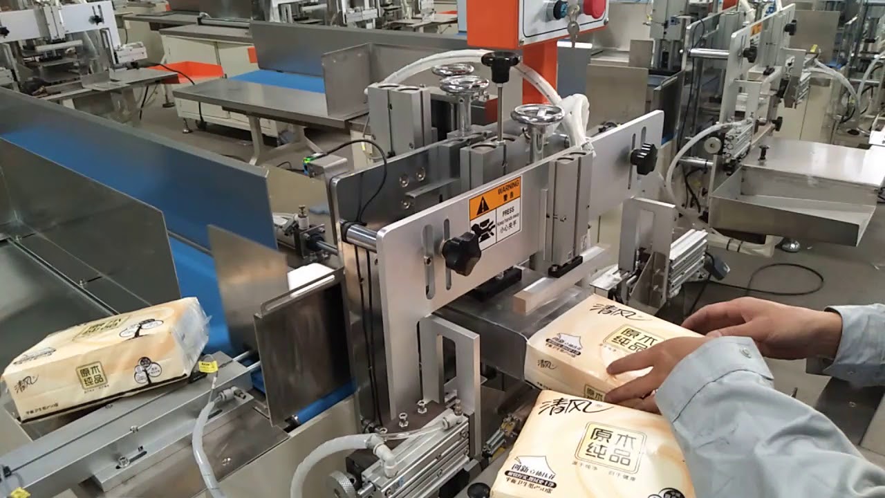 Dinner napkin paper filling sealing machine