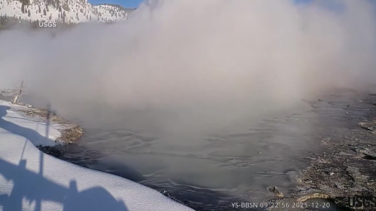 Muddy eruption at Black Diamond Pool in Yellowstone National Park