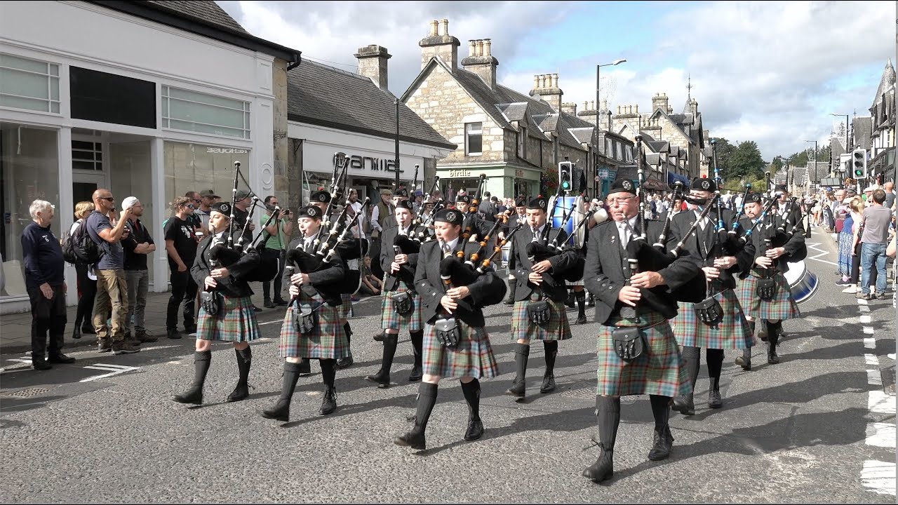 Scotland the Brave as Ellon RBL Pipe Band march in street parade to 2023 Pitlochry Highland Games