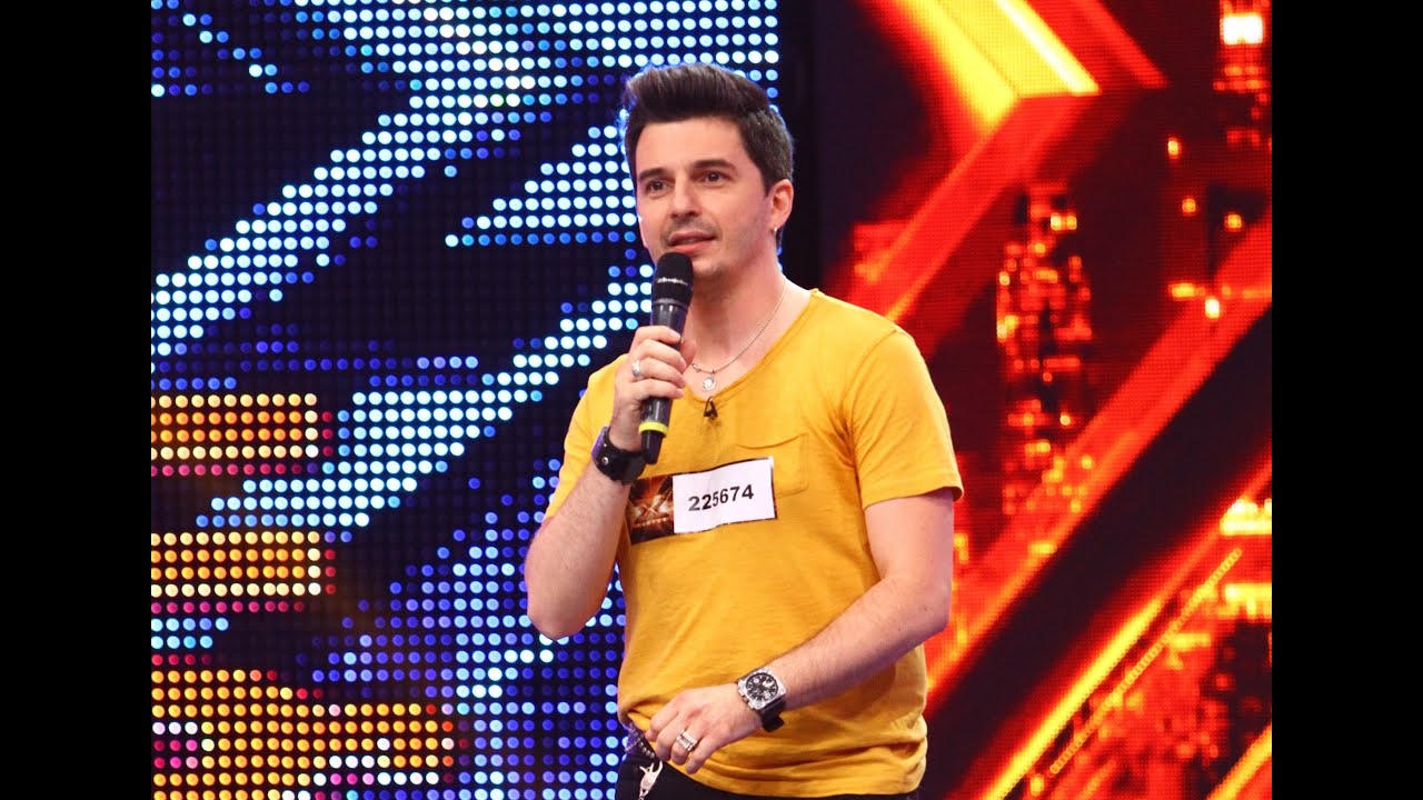 Robbie Williams - Let Me Entertain You. Vezi interpretarea lui Alex Vasilache, la X Factor!
