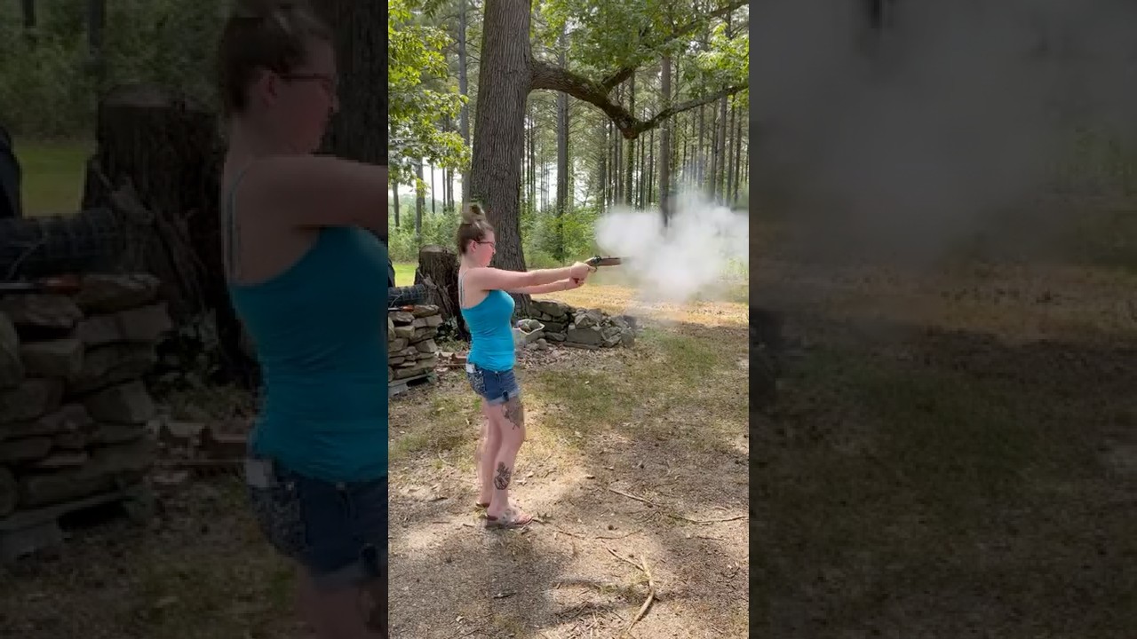 My girlfriend shooting 50 cal black powder pistol