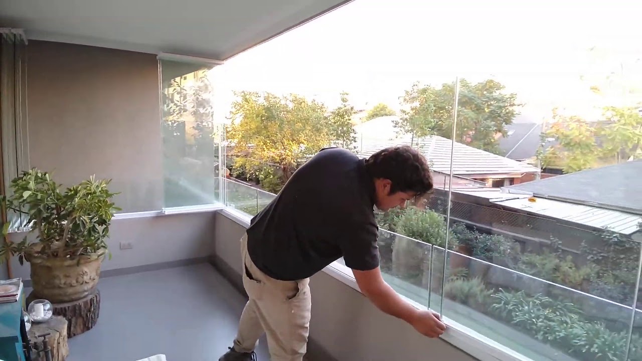 Cierre de balcones con ventanas plegables