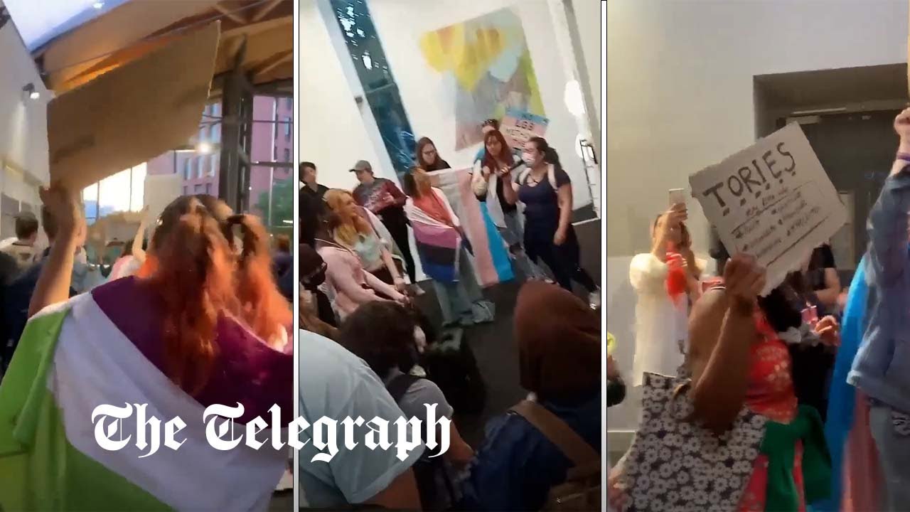 Trans activists chant 'Tory scum' at the Education Secretary, during University of Warwick speech