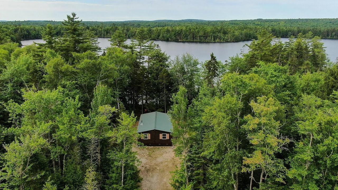 Off-Grid Lakeside Living? This Maine Home for Sale Has 1,350 Feet of Waterfront!