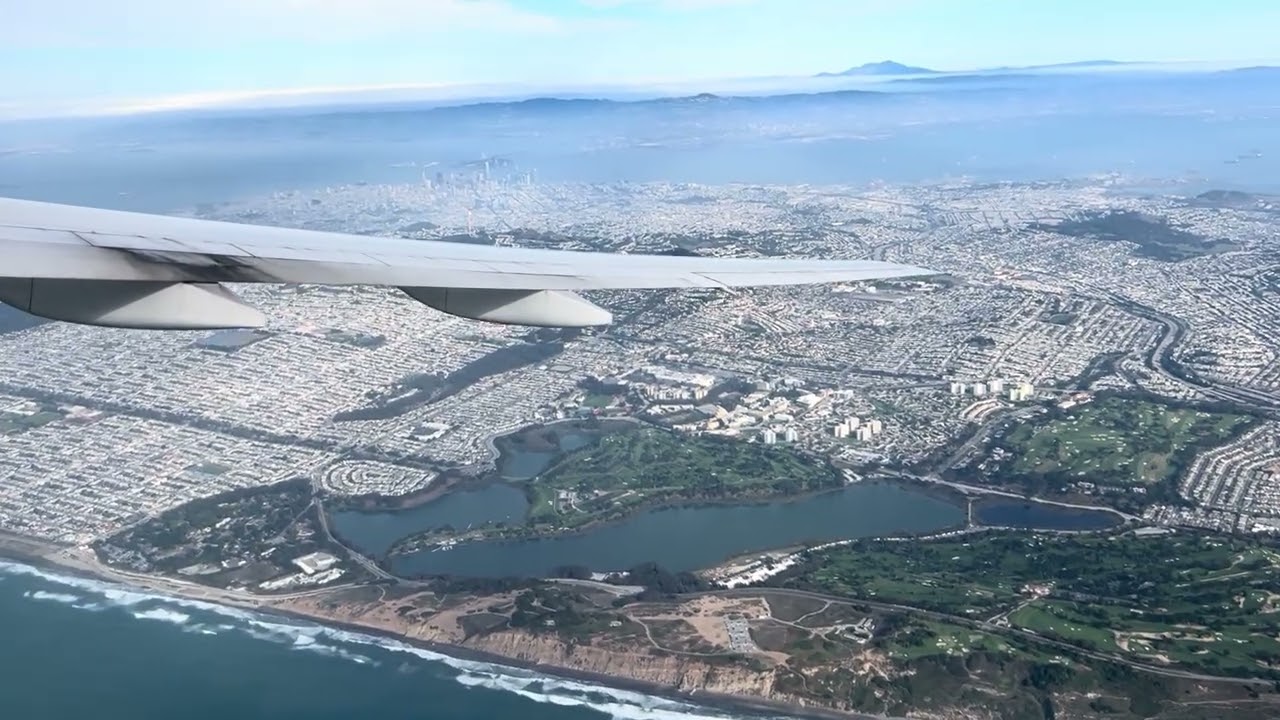 Taking off from SFO heading towards LHR in a United Airlines Boeing 777-222 ER with views of City