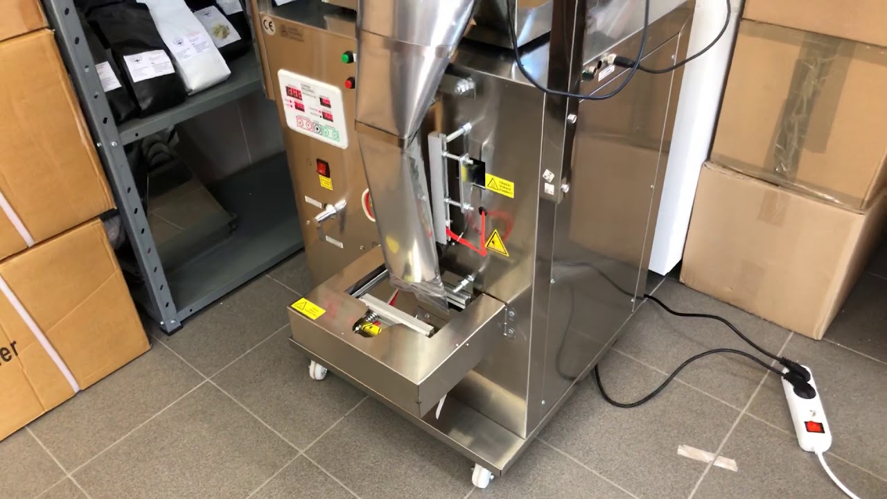Automatic packing machine for coffee.