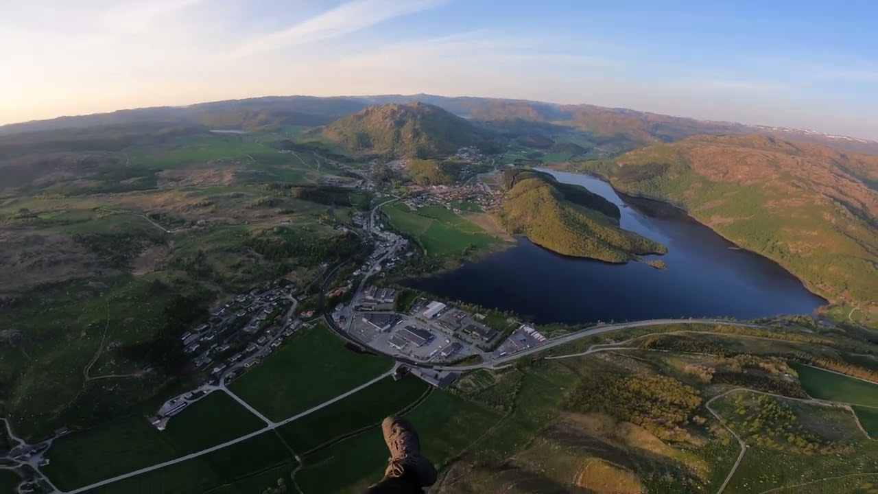 Evening flight over Vikeså. Råsafjellet. Norway.