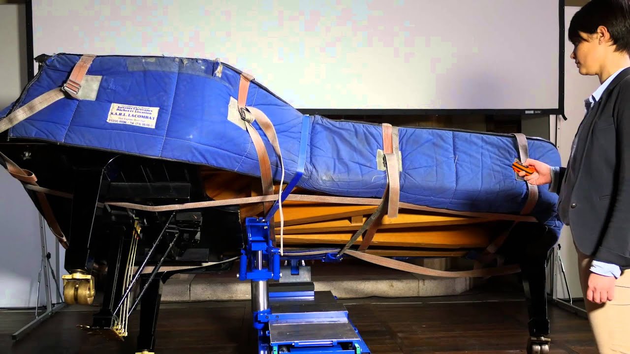 Pianolift2 moving upstairs and tilting a grand concert steinway.