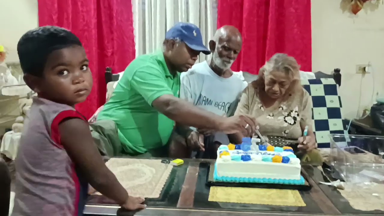 Happy 75th Birthday Mom part 2 cake cutting.