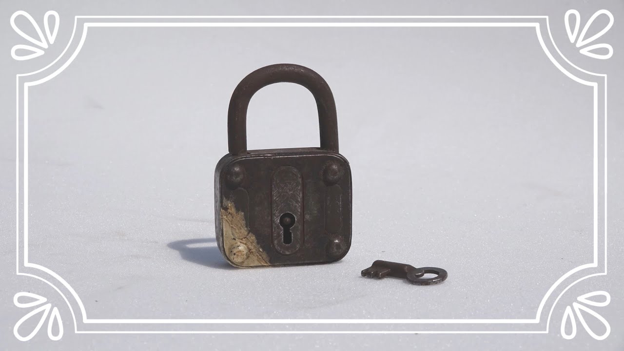 Rusty old  padlock with key ( Restoration )