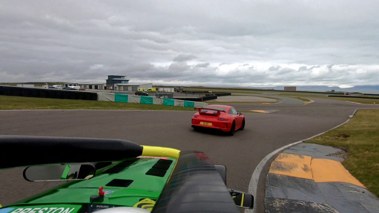 Caterham 420R at Anglesey chasing Porsches etc