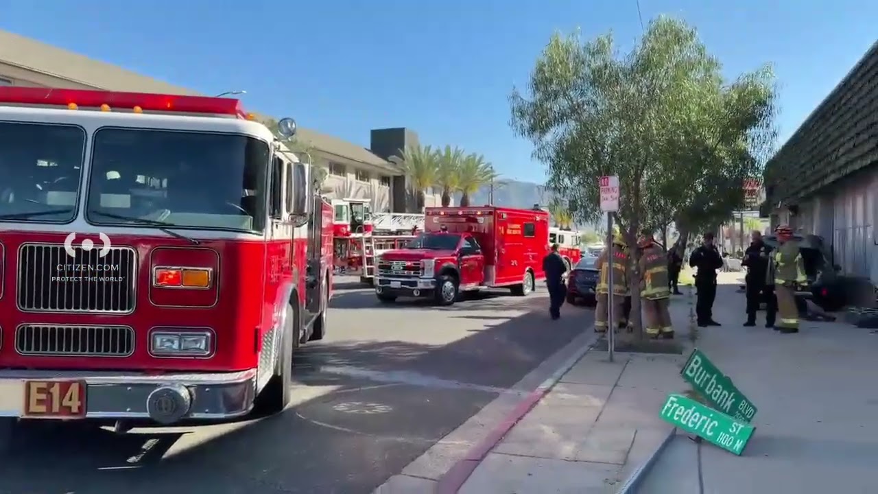 Green SUV struck Street Sign