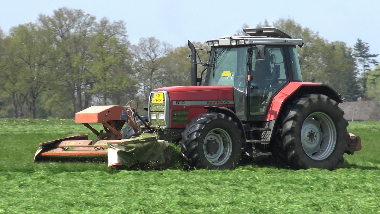 Gras maaien met Massey Ferguson 8110 Dynashift en Kuhn maaiers (2017)