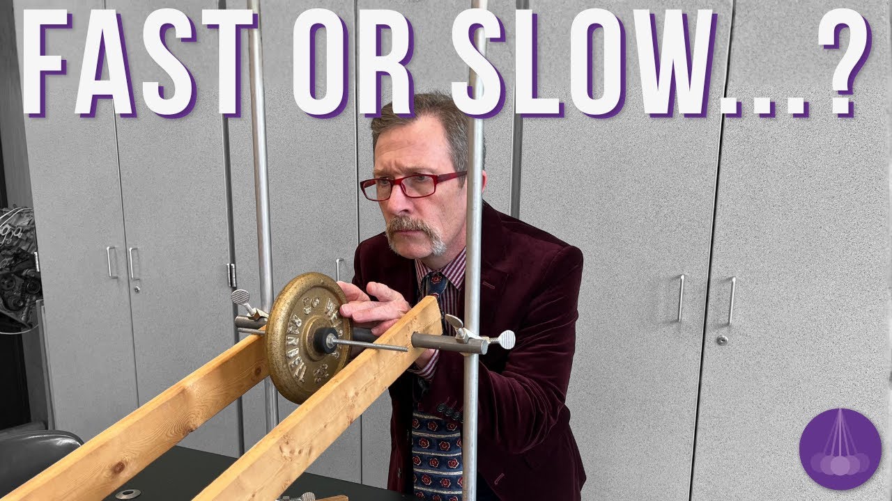 Torque Challenge Problem: How Fast will the Flywheel Roll?