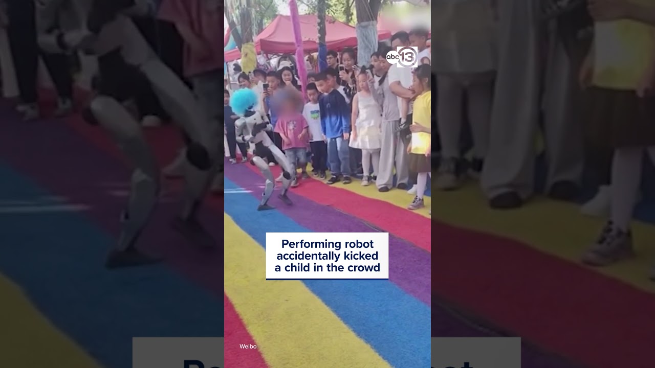Performing robot accidentally kicked a child in the crowd