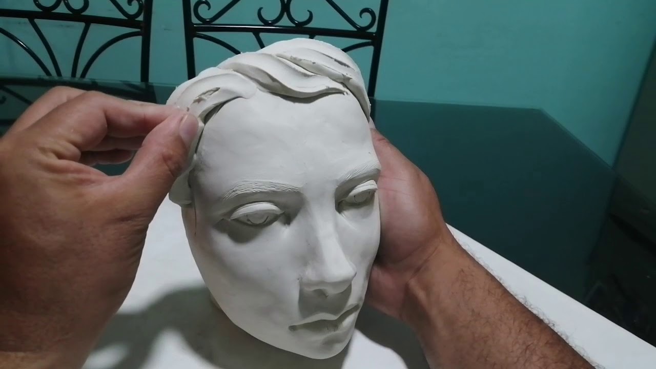 Escultura, modelado del cabello a tres dedos.