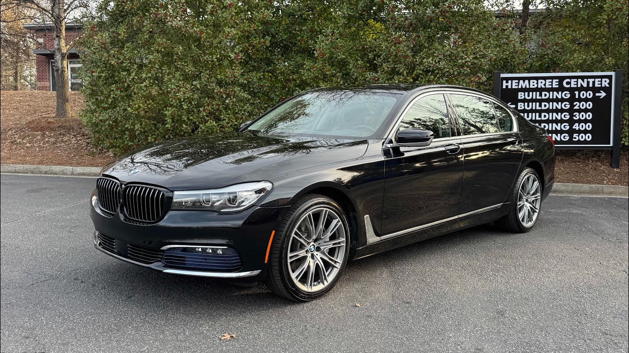 BMW 740i 2016 года — пробег 75 тыс. миль, цвет «Черный сапфир металлик», пакет «Executive 2», в о...