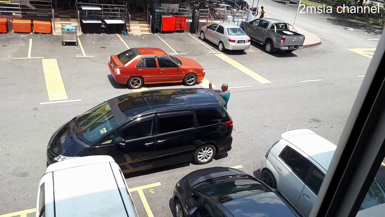 Why Malaysian Double Parking when empty parking is available