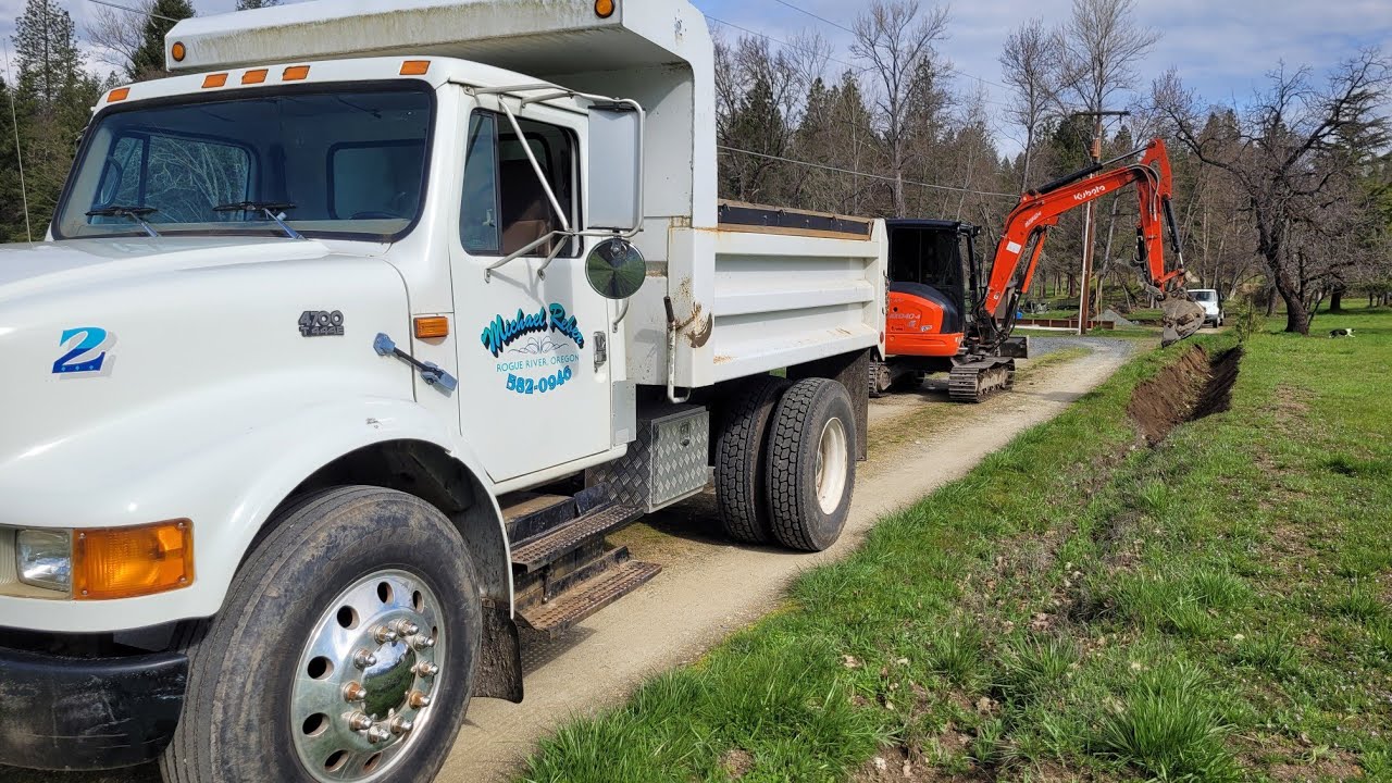 Stumpin ditch cleaning & drilling with the Kubota KX-040
