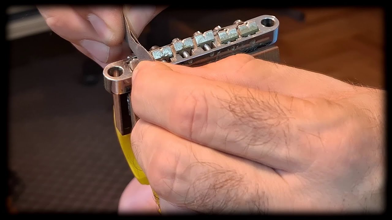Kako zaustaviti pucanje žica na mostu električne gitare.(How to stop breaking strings on guitar )