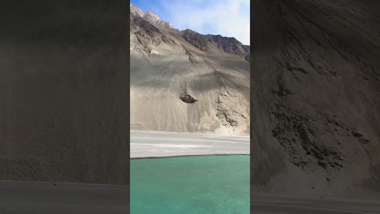 Mesmerizing Scenery of Passu Cones and Crystal Aqua water  